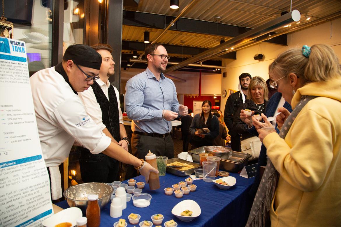 Culinary arts students serve their seaweed creations to attendees during Urchin Tank, 2022.