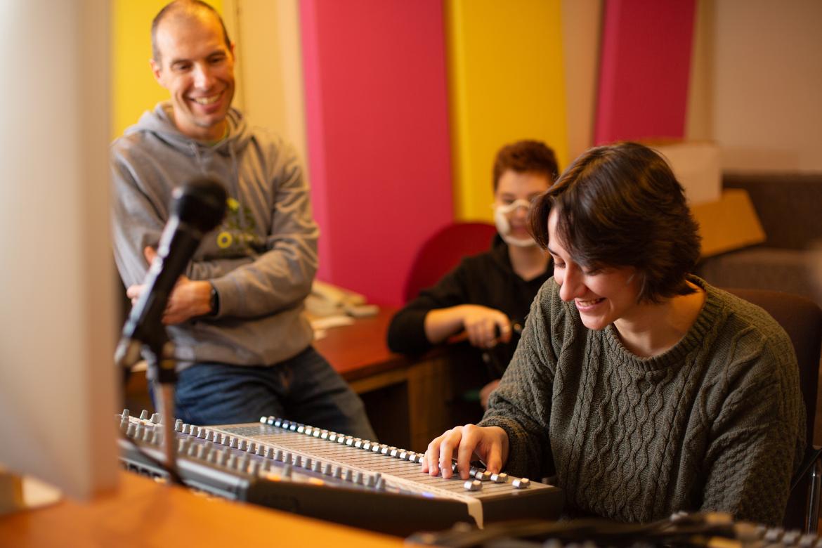 A VIU music student works on an audio recording device.